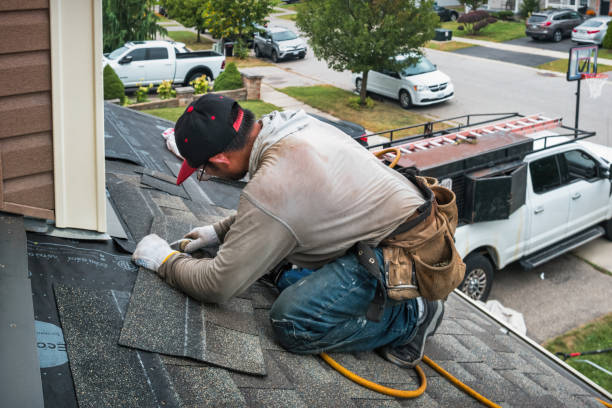 Professional Gutter Repair And Installation technician working in Allston, MA